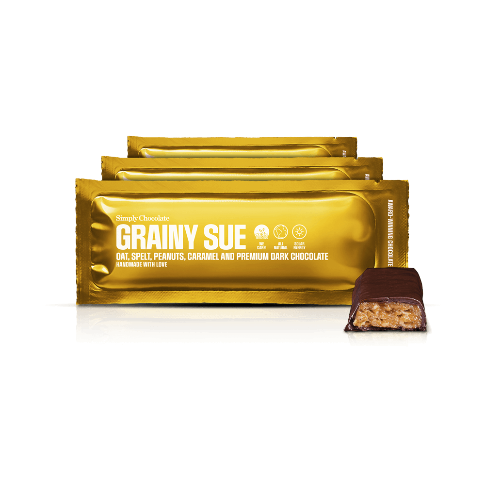 Grainy Sue 12-pack | Havre, spelt, peanuts, karamel og premium mørk chokolade Grainy Sue 12-pack | Havre, spelt, peanuts, karamel og premium mørk chokolade